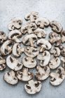 Sliced champignon mushrooms — Stock Photo