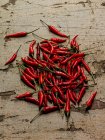 Pile of chili peppers, top view — Stock Photo