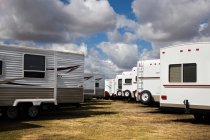 Trailers parked in field for sale — Stock Photo