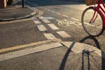 Cycle path and bicycle wheel — Stock Photo