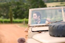 Man in an off-road vehicle — Stock Photo
