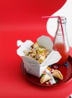Chicken and vegetables in take out box with juice bottle — Stock Photo