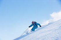 Male skiing downhill in winter — Stock Photo