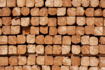 Industrial stacked wood, carpentry background — Stock Photo