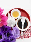 Top view of tray with teapot, cup and soy sauce in bowl — Stock Photo