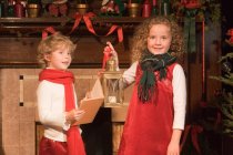 Children singing Christmas carols — Stock Photo