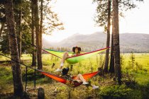 Women on hammocks at Rocky Mountain National Park, Colorado, USA — Stock Photo