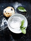 Still life of blueberry scone with caster sugar — Stock Photo