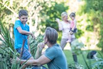 Cape Town, South Africa, family together in garden — Stock Photo