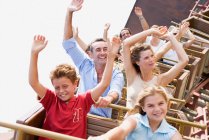 Family on a rollercoaster — Stock Photo