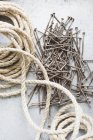 Close up of sisal rope and screws — Stock Photo
