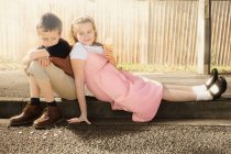 Siblings together in the street — Stock Photo