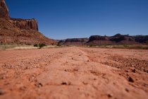 Dirt road and rock formations — Stock Photo