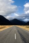Road towards Arthur Pass in mountains — Stock Photo