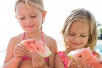 Girls with watermelon slices — Stock Photo