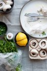 Lemon, herbs, mushrooms and cheese — Stock Photo