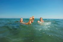 Two girls floating in the sea — Stock Photo