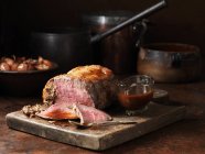 Sirloin of beef with mushrooms stuffing and sauce — Stock Photo