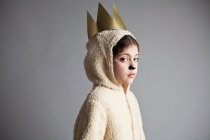 Young girl dressed up as sheep, wearing gold crown — Stock Photo