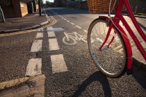 Bike path with bicycle wheel — Stock Photo