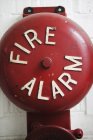 Close up of Fire alarm on brick wall — Stock Photo