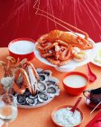 Plates of lobsters, prawns and mussels — Stock Photo