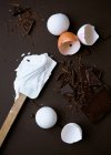 Eggshells with meringue and chocolate — Stock Photo