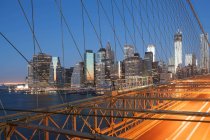 Observing view of New York City bridge and skyline — Stock Photo