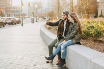 Young couple taking selfie in city, Boston, Massachusetts, USA — Stock Photo