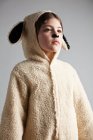 Young girl dressed up  in  sheep costume — Stock Photo