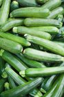Pile of green courgettes, top view — Stock Photo
