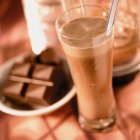 Chocolate milkshake in glass — Stock Photo