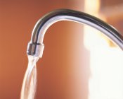 Close up of Running tap in motion — Stock Photo