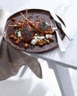 Plate of lamb with Moroccan beans — Stock Photo
