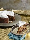 Christmas cake on silver serving dish with pastry fork — Stock Photo