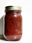 Jar of juneberry jam — Stock Photo