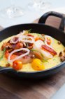 Dish of grits with shrimp — Stock Photo