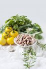 Pinto beans and yellow tomatoes, still life — Stock Photo