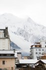 Mountain and buildings in chamonix — Stock Photo
