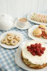 Tea with biscuits and cakes — Stock Photo