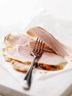 Wiltshire Ham slices with fork, close up shot — Stock Photo