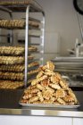 Stack of waffles on baking tray in bakery — Stock Photo