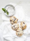 Still life of blueberry scones served with sugar powder — Stock Photo