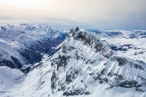 Paisaje cubierto de nieve de ángulo alto, Monte Titlis, Suiza - foto de stock