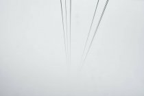 Cable car cables disappearing into mist, Mount Pilatus, Switzerland — Stock Photo