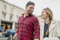Young couple strolling on Kings Road, London, UK — Stock Photo