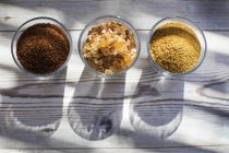 Glasses of sugar in various forms, top view — Stock Photo