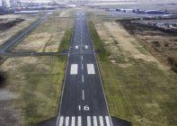 Aerial view of aphalt airport runway — Stock Photo