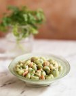Butter beans with pancetta and parsley in bowl — Stock Photo