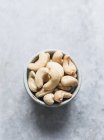 Studio shot, top view of cashew nuts in bowl — Stock Photo